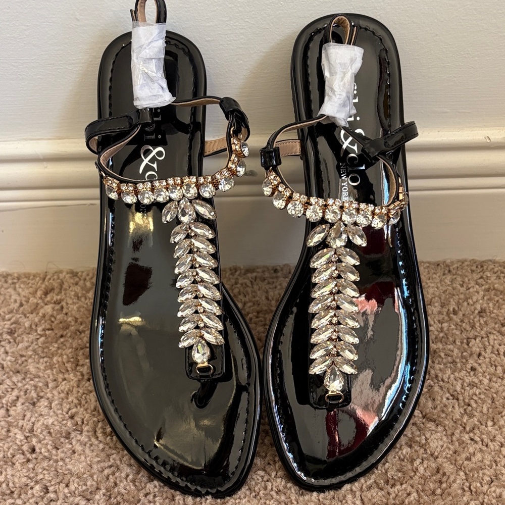 Fibi & Clo sandals with a black patent leather insol